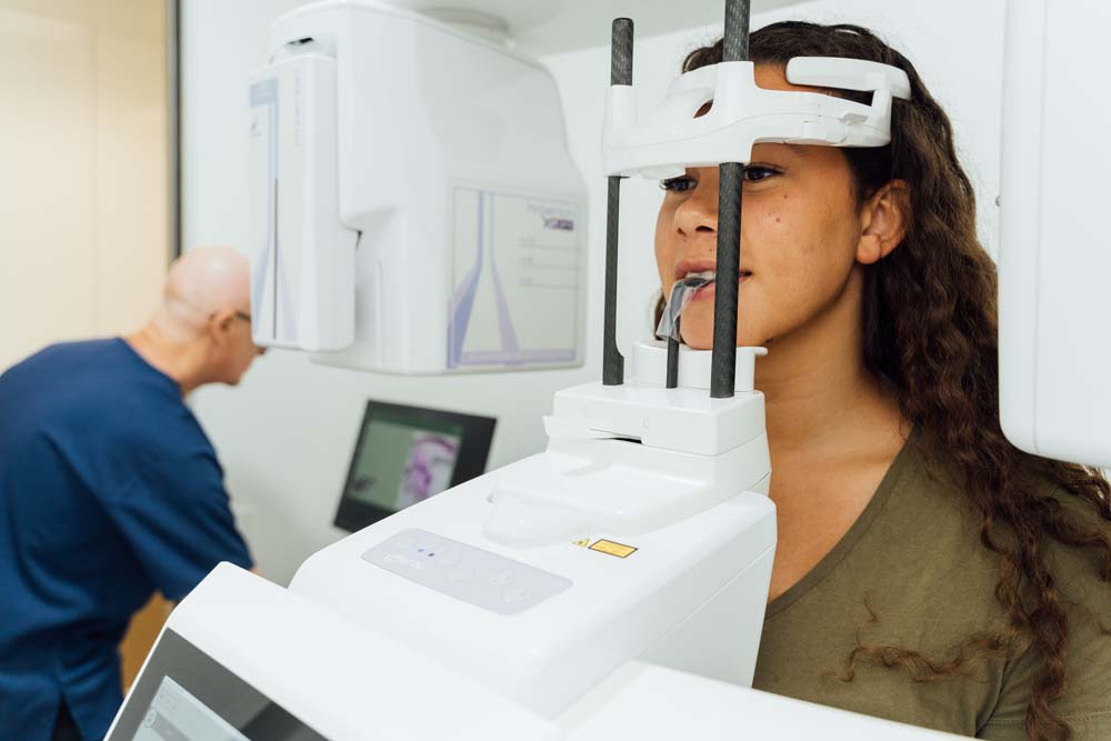 Photo of a female patient being scanned for prosthodontics | featured image for Dental Prosthodontics.