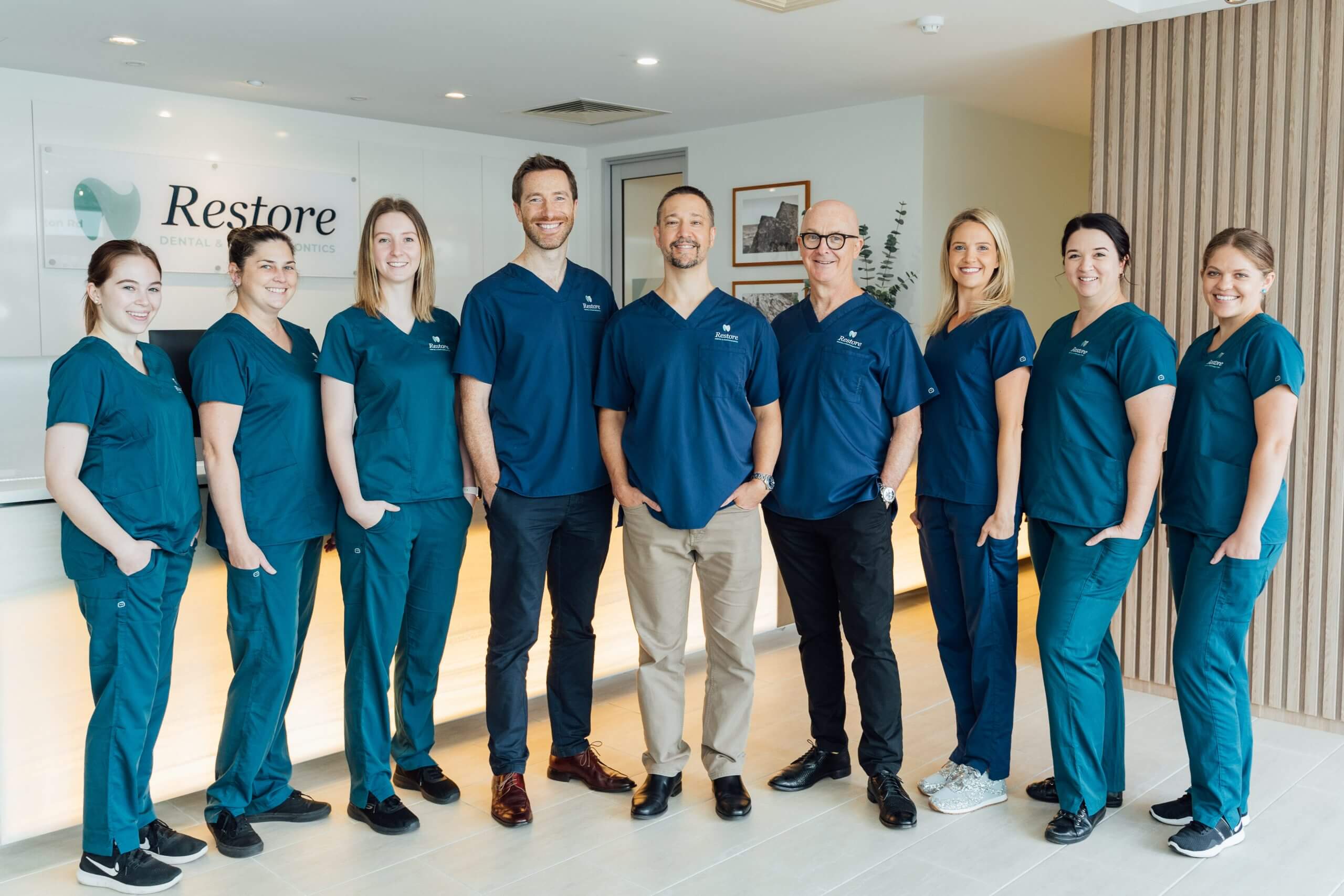 Restore Dental team photo | Featured image for the Dental Implants Chermside page by Restore Dental.